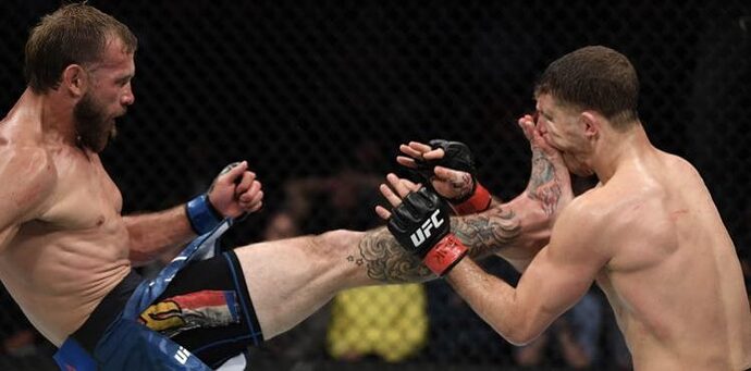 Cowboy-Cerrone-Al-Iaquinta-kick-748x370