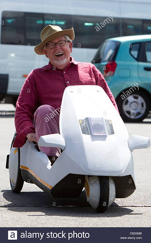 australian-television-presenter-rolf-harris-rides-in-a-sinclair-c5-C62GMB